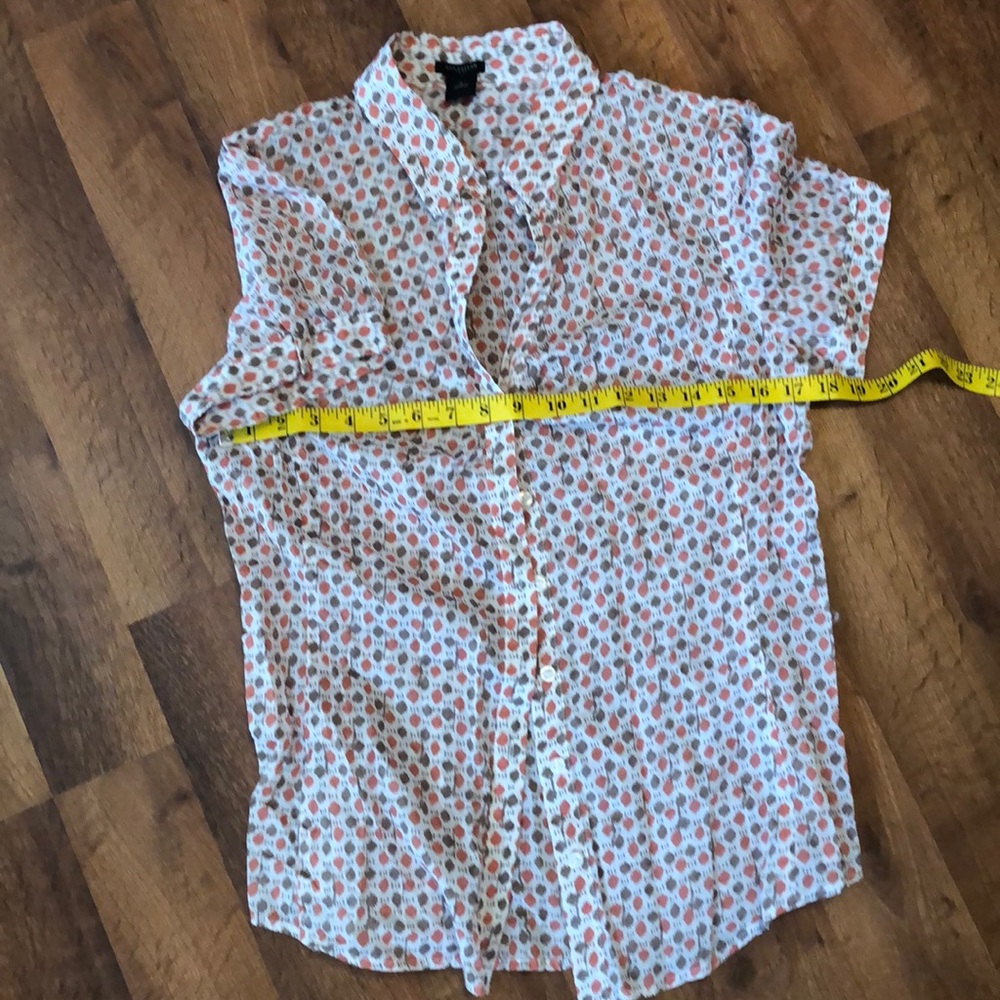 White Blouse with brown and coral pattern.